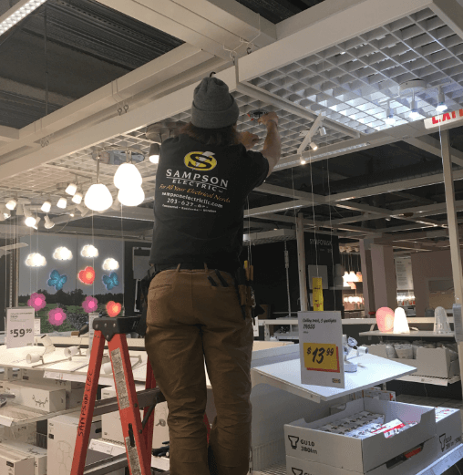 Electrician Fixing Lights